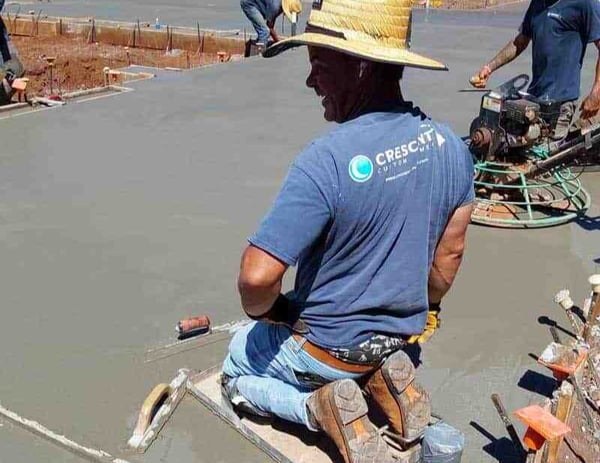 Cement-workers-smoothing-concrete-floors