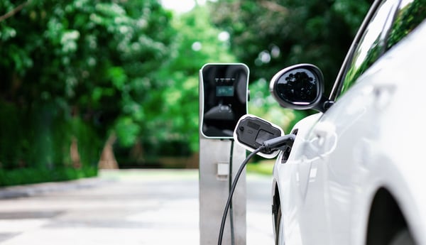Electric-vehicle-car-and-charger-outside-1