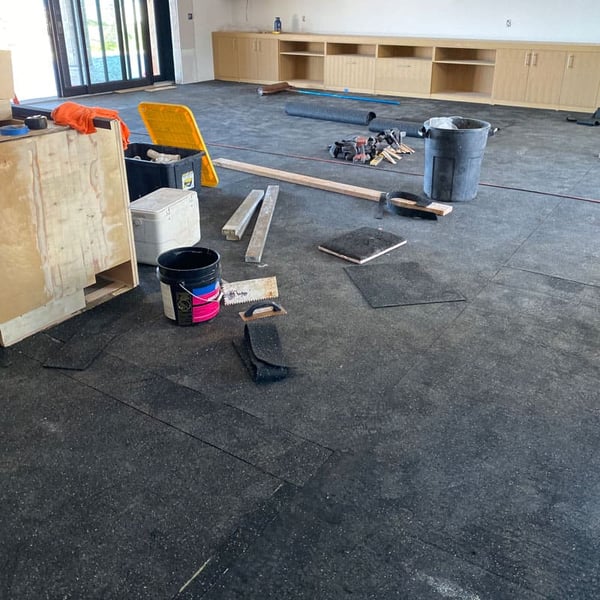 Sound-Dampening-Wood-Floor-installation-cross-room