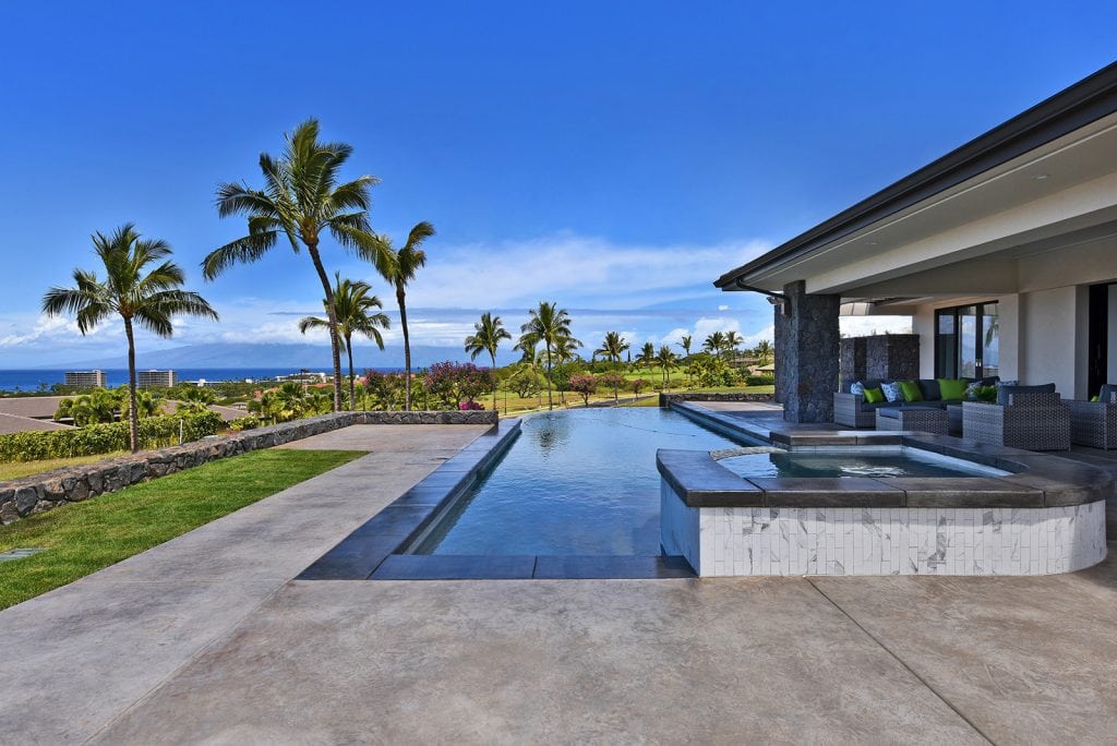 Image of recent new construction completed with infinity pool on Maui by Crescent Homes Maui.