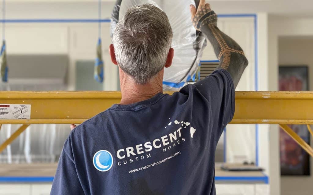 Crescent Homes Maui employee remodeling a home.