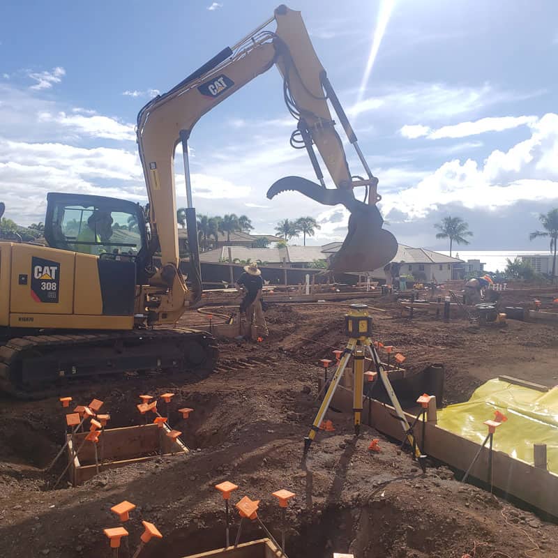 CAT Excavator preparing the site a new Maui home.