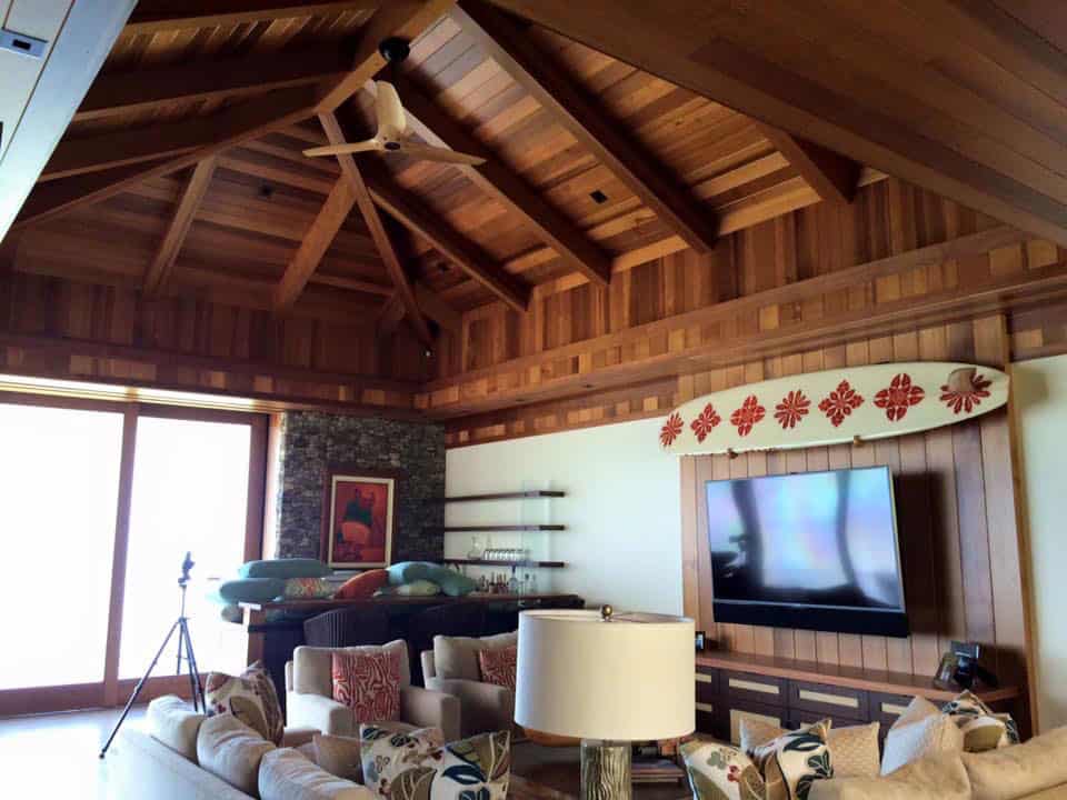 Living room with exposed rafters freshly refinished by Crescent Homes Maui