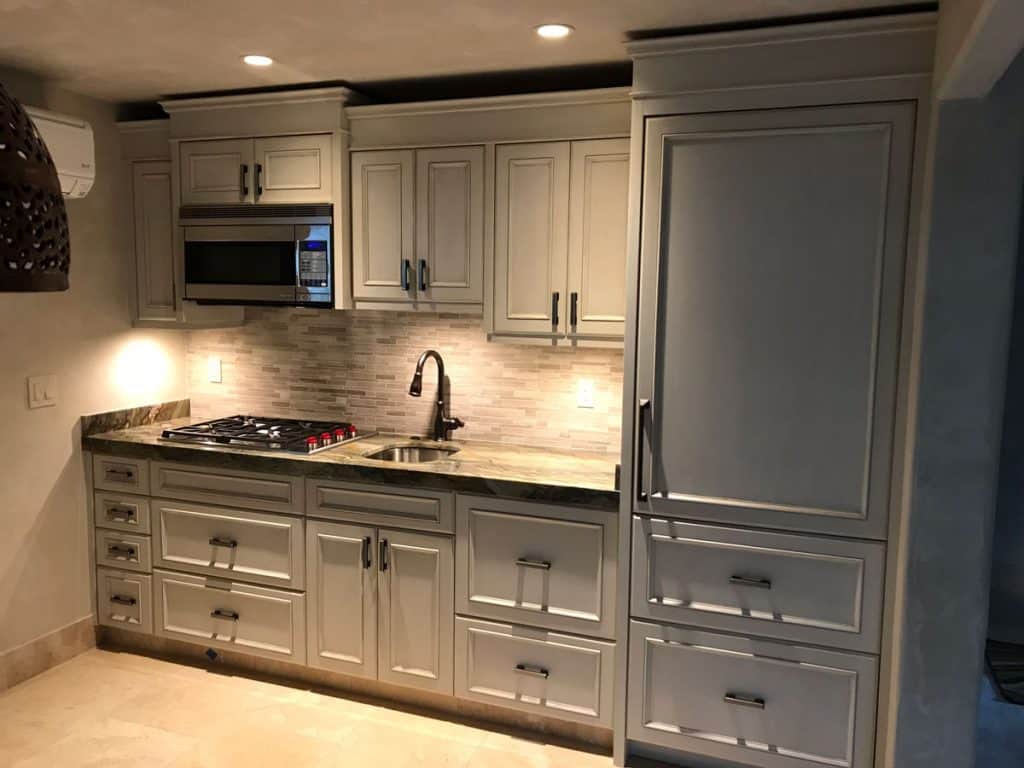 Recently remodeled kitchen with freshly restored and repainted cabinet doors